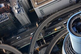 Aerial view of skyscrapers and a downtown city street