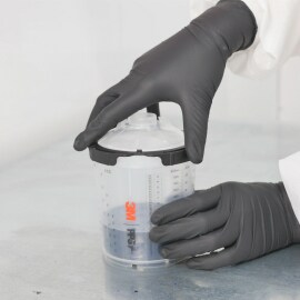 locking the lid into the paint cup