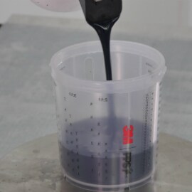 placing a new liner in the hard paint cup