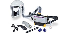 A machine with a hose and other objects
