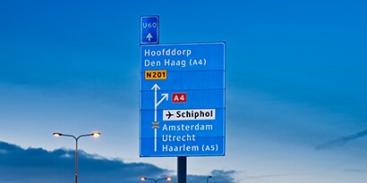 blue sign with white text
