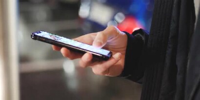 A person holding a cell phone