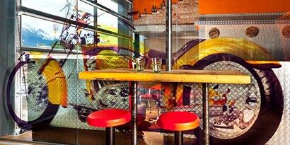 Interior of store glass window graphic of motorcycle using 3M IJ8150 film
