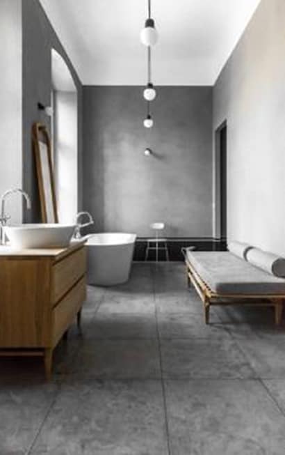 bathroom with a bench and sink
