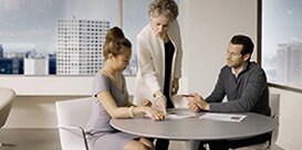 group of women sitting at a table
