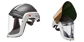 A pair of black and white helmets
