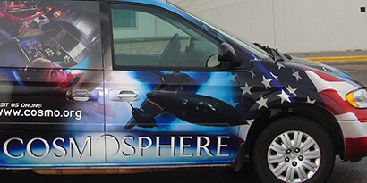A van with an American flag 3M graphic wrap on it to show customers how to go to town in style.
