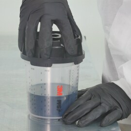stabilizing the cup in the paint shaker