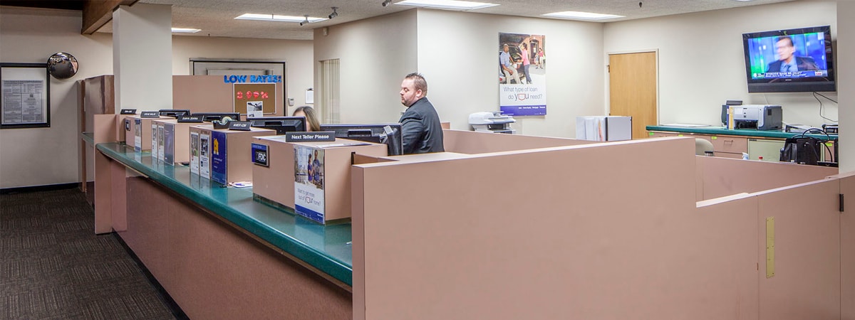 person sitting at a desk
