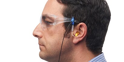 Man wearing earfit product and safety glasses
