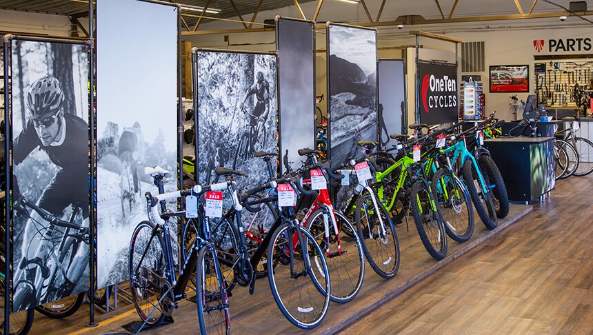 row of bicycles in a store
