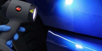 선 건 대체 텍스트 - 3M 선 건을 사용한 도장 작업 
