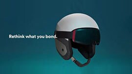 Video still of a safety helmet composed of many LSE or composite substrates and the caption “Rethink what you bond”