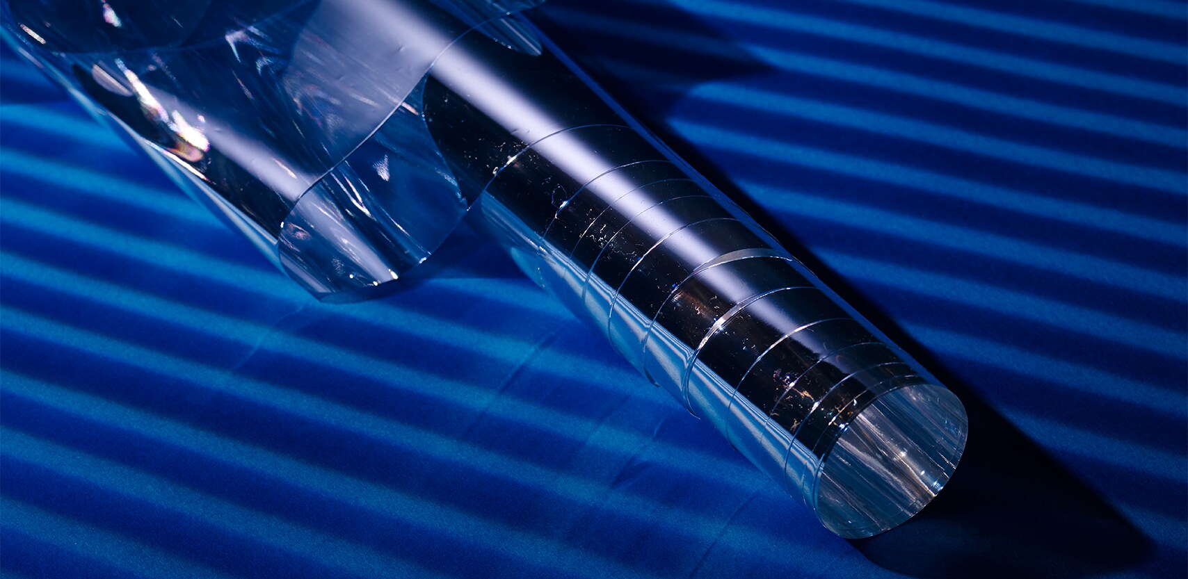 An image of 3M™ Reflective Polarizer Films on a colored background.
