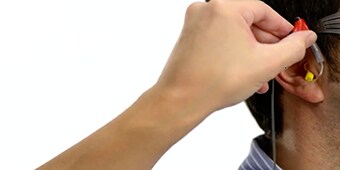 A close-up of a hand holding a phone
