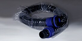 A black hose with blue handles
