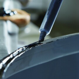 Liquid structural adhesive application for automotive