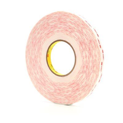 A roll of tape with red text
