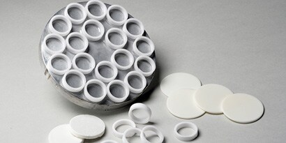 A group of white round objects
