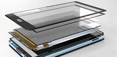 An image of smart phone layers including optically clear adhesives.

