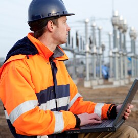 worker on laptop outside