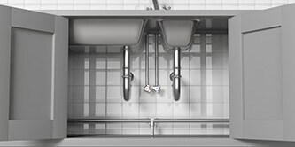 An open view of sink doores exposing the pipes
