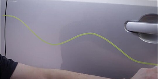 green line on a white surface
