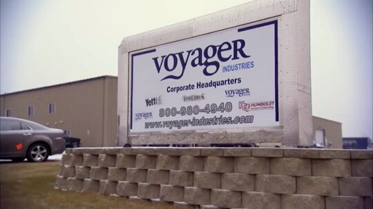 A large white sign with blue text
