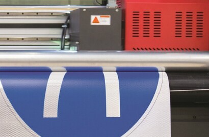 Digitally printed sign sheeting coming out of EFI digital sign printer
