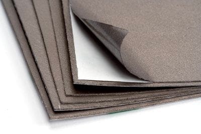 close-up of a stack of grey paper

