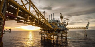  oil and gas rig over water
