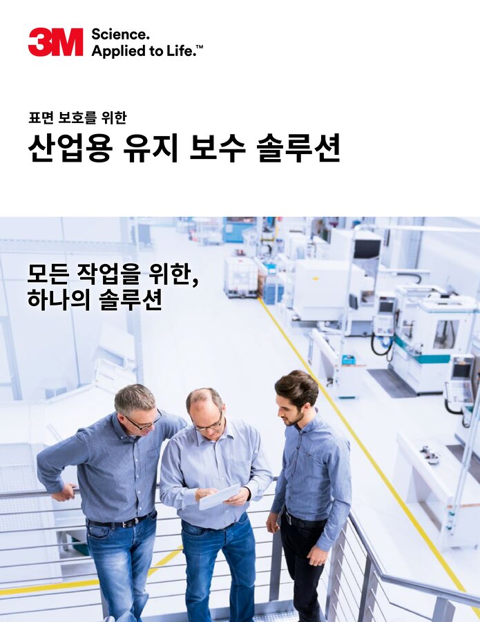Three office workers talking to each other
